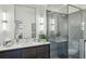 This bathroom features a glass shower, modern fixtures, and good lighting at 100 Tuxedo Nw Ter, Atlanta, GA 30342