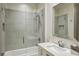 This bathroom features a glass shower, bathtub, and modern sink at 100 Tuxedo Nw Ter, Atlanta, GA 30342