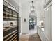Modern kitchen featuring a wine fridge, stainless steel appliances, and hardwood floors at 100 Tuxedo Nw Ter, Atlanta, GA 30342