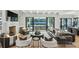 Spacious living room with fireplace, plush seating, and seamless indoor-outdoor flow at 100 Tuxedo Nw Ter, Atlanta, GA 30342
