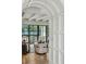 Bright living area with sleek furniture, hardwood floors, and sliding glass doors for indoor-outdoor living at 100 Tuxedo Nw Ter, Atlanta, GA 30342