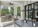 Close up of the outdoor kitchen with stainless steel grill, sink, and granite counters at 100 Tuxedo Nw Ter, Atlanta, GA 30342