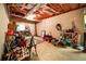 An unfinished basement offers space for storage and DIY projects with exposed ceiling at 1394 Meadow Springs Dr, Lilburn, GA 30047