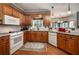 Well-equipped kitchen featuring modern appliances, ample counter space, and hardwood floors at 1394 Meadow Springs Dr, Lilburn, GA 30047