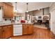 Open-concept kitchen offering seamless access to the breakfast nook and a cozy living area at 1394 Meadow Springs Dr, Lilburn, GA 30047