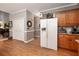 Updated kitchen with modern appliances, a built-in refrigerator, and easy access to the living spaces at 1394 Meadow Springs Dr, Lilburn, GA 30047