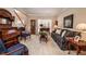 Comfortable living room with a piano, classic decor, and ample seating at 1394 Meadow Springs Dr, Lilburn, GA 30047