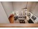 Overhead view of the living room featuring high ceilings, arched windows, and a fireplace at 1394 Meadow Springs Dr, Lilburn, GA 30047