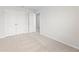 A bright bedroom features neutral carpet, and a double door closet for ample storage space at 7158 Brushwood Bend (110), Lithonia, GA 30058