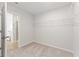 Walk-in closet featuring carpet flooring and wire shelving at 7158 Brushwood Bend (110), Lithonia, GA 30058
