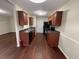 Kitchen featuring dark cabinets and appliances at 1606 Little Creek Dr, Lawrenceville, GA 30045