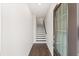 Inviting entryway with dark-stained wood floors and a staircase leading to the upper level at 1729 Lansmere Sw St, Marietta, GA 30008