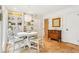 Cozy dining area with custom shelves and natural light; perfect for Gathering meals at 2528 Fernleaf Nw Ct, Atlanta, GA 30318