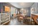 Elegant dining room with rich wood floors, wainscoting, and stylish decor for sophisticated gatherings at 2528 Fernleaf Nw Ct, Atlanta, GA 30318