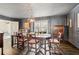 Elegant dining room with rich wood floors, wainscoting, and stylish decor for sophisticated gatherings at 2528 Fernleaf Nw Ct, Atlanta, GA 30318