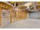 Unfinished basement displays open framing, concrete flooring, and exposed ductwork for potential build-out at 30 Magnolia Dr, Oxford, GA 30054