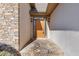 Inviting front entrance featuring a stone pathway, accent wall, and a stylish front door at 30 Magnolia Dr, Oxford, GA 30054