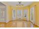 Inviting living room with hardwood floors, natural light, and elegant crown molding at 30 Magnolia Dr, Oxford, GA 30054