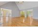 Open living room featuring hardwood floors, many rooms, and great natural lighting at 30 Magnolia Dr, Oxford, GA 30054