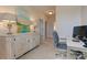 Well-appointed office with a stylish credenza, modern desk, and comfortable chair for remote work at 505 Rocking Porch Way Way, Woodstock, GA 30189