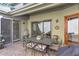 Relaxing outdoor patio with dining table and chairs, perfect for outdoor entertaining and al fresco dining at 505 Rocking Porch Way Way, Woodstock, GA 30189