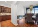 Elegant dining room features hardwood floors, mirrored walls, and detailed trim at 538 Sarabrook Ne Pl, Atlanta, GA 30342