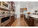 This modern kitchen features a large island with a stainless sink and Viking appliances at 538 Sarabrook Ne Pl, Atlanta, GA 30342