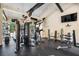 Well-equipped gym featuring modern exercise equipment and large windows overlooking the outdoor pool area at 538 Sarabrook Ne Pl, Sandy Springs, GA 30342