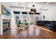 This is a bright living room with fireplace, hardwood floors, and stylish furnishings at 538 Sarabrook Ne Pl, Sandy Springs, GA 30342