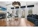 This is a bright living room with fireplace, hardwood floors, and stylish furnishings at 538 Sarabrook Ne Pl, Sandy Springs, GA 30342