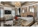 Stately bedroom with neutral decor, flat screen television and stylish furnishings at 538 Sarabrook Ne Pl, Sandy Springs, GA 30342