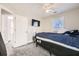 Bedroom with carpeted floor, ceiling fan, and window at 775 Welch Sw St, Atlanta, GA 30310