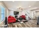 Bright living room with a ceiling fan, fireplace, and hardwood floors at 775 Welch Sw St, Atlanta, GA 30310