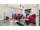 Comfortable living room featuring hardwood floors, neutral walls, and a fireplace at 775 Welch Sw St, Atlanta, GA 30310