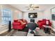 Cozy living room with hardwood floors, a ceiling fan, and modern decor at 775 Welch Sw St, Atlanta, GA 30310