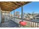 This porch is the perfect spot to enjoy a barbecue, with a grill and a beautiful view of the neighborhood at 775 Welch Sw St, Atlanta, GA 30310