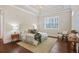 Serene bedroom with a tray ceiling, hardwood floors, and natural light at 1078 Amarose Ln, Marietta, GA 30066