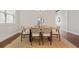 Dining room featuring modern light fixture and furniture at 1078 Amarose Ln, Marietta, GA 30066