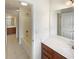 Bathroom featuring a combined shower and tub with chrome hardware and wood vanity at 149 Fishers Mill Dr, Mcdonough, GA 30252