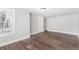 This bedroom features hardwood floors and a window providing natural light at 174 Howard Nw St, Atlanta, GA 30314