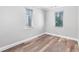 Cozy bedroom features modern wood-look flooring and neutral walls at 174 Howard Nw St, Atlanta, GA 30314