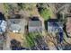 Aerial view of neighborhood with manicured lawns and mature trees at 1834 Buckeye Sw St, Atlanta, GA 30310