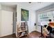 Bedroom with hardwood floors, natural light, and neutral wall color at 1834 Buckeye Sw St, Atlanta, GA 30310