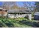 Cozy single-story home with a painted brick exterior and a well-maintained front yard at 1834 Buckeye Sw St, Atlanta, GA 30310