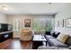 Comfortable living room featuring hardwood floors, natural light, and a cozy beanbag chair at 1834 Buckeye Sw St, Atlanta, GA 30310