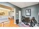 Cozy breakfast area near kitchen with bar stools, table and decor at 7717 Bellmist Dr, Fairburn, GA 30213