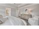 Main bedroom featuring neutral decor, ensuite access, and natural light at 1733 Lansmere Sw St, Marietta, GA 30008