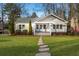 Charming craftsman home with a stepping stone pathway and a welcoming front porch at 1764 Pennington Se Pl, Atlanta, GA 30316