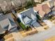 An aerial view of a neighborhood showcasing a well-maintained home with a grey roof at 420 Rammel Oaks Dr, Avondale Estates, GA 30002