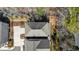 This aerial view highlights the roof and the driveway of the house at 475 Rowes Cir, Alpharetta, GA 30009